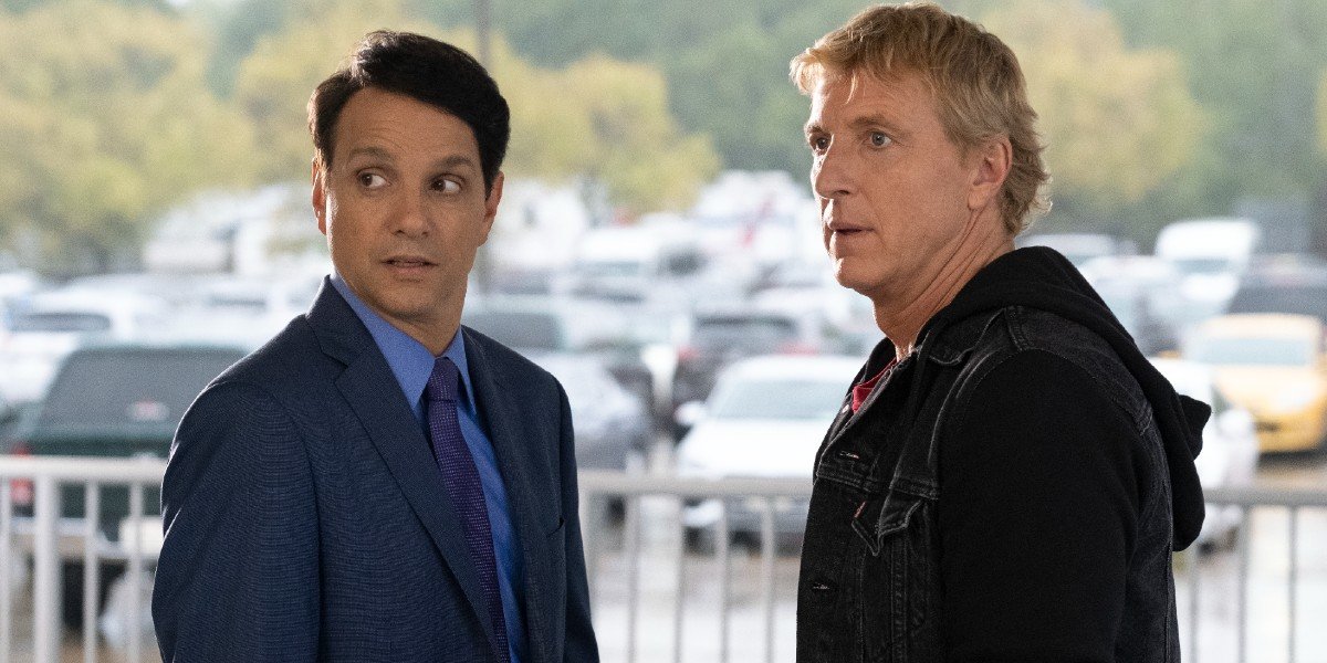 Daniel LaRusso (Ralph Macchio) and Johnny Lawrence (William Zabka) look on in Cobra Kai (2021)