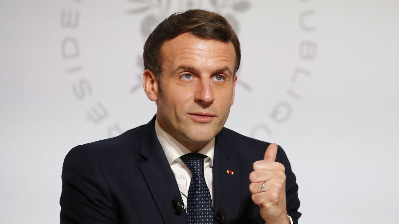 Emmanuel Macron attends a video conference at the Elysee Palace.