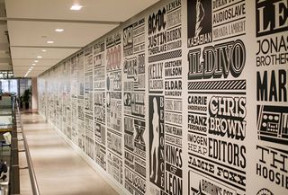 Designer Alex Fowkes was the brains behind Sony Music's new timeline, which covers almost 150 square metres of wall space in the music company's Derry St offices. Image © Rob Antill