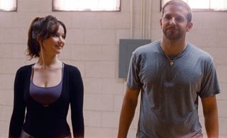 jennifer lawrence and bradley cooper practicing a dance in silver linings playbook