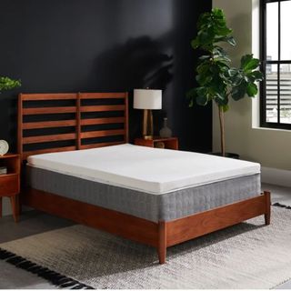 TEMPUR-Supreme Mattress Topper on top of mattress on bed frame in bedroom