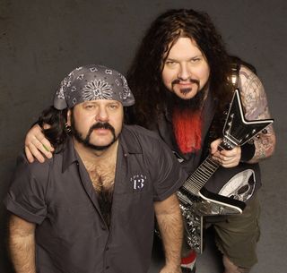 Dimebag Darrell and brother Vinnie Paul, taken at one of their final photoshoots in July 2004.