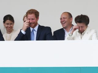 Prince Harry, Mike Tindall, and Princess Anne laughing in 2016