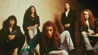 Queensryche posing for a photo