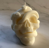 Skull snake candle: Was £17.99, now £13.49