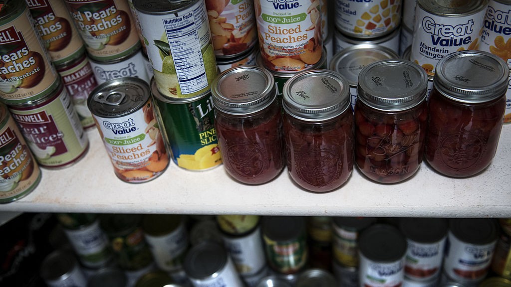 A stocked shelf in a food pantry.