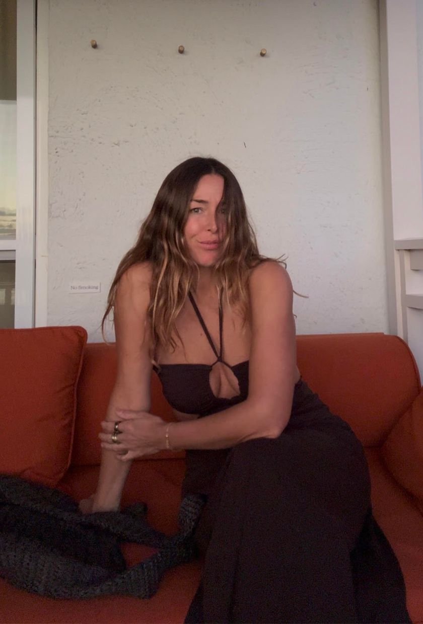Angie wears a dress from Hush