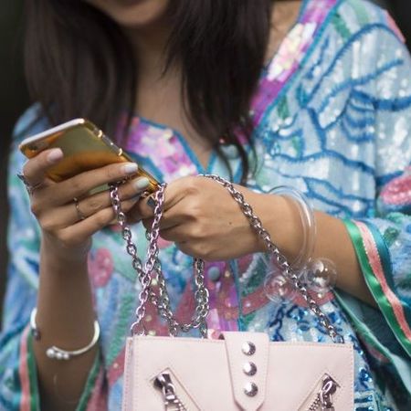 Woman Texting on Phone