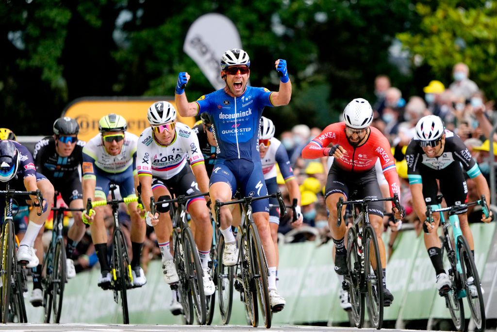 FOUGERES FRANCE JUNE 29 Jasper Philipsen of Belgium and Team AlpecinFenix Mark Cavendish of The United Kingdom and Team Deceuninck QuickStep stage winner celebrates at arrival Peter Sagan of Slovakia and Team BORA Hansgrohe Nacer Bouhanni of France and Team Arka Samsic Michael Matthews of Australia and Team BikeExchange sprint at arrival during the 108th Tour de France 2021 Stage 4 a 1504km stage from Redon to Fougres LeTour TDF2021 on June 29 2021 in Fougeres France Photo by Daniel Cole PoolGetty Images