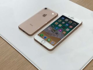 The iPhone 8 (facedown) and the iPhone 8 Plus