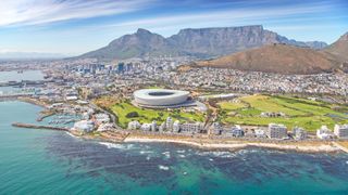Aerial photo of Cape Town Stadium with Table Mountain in the background