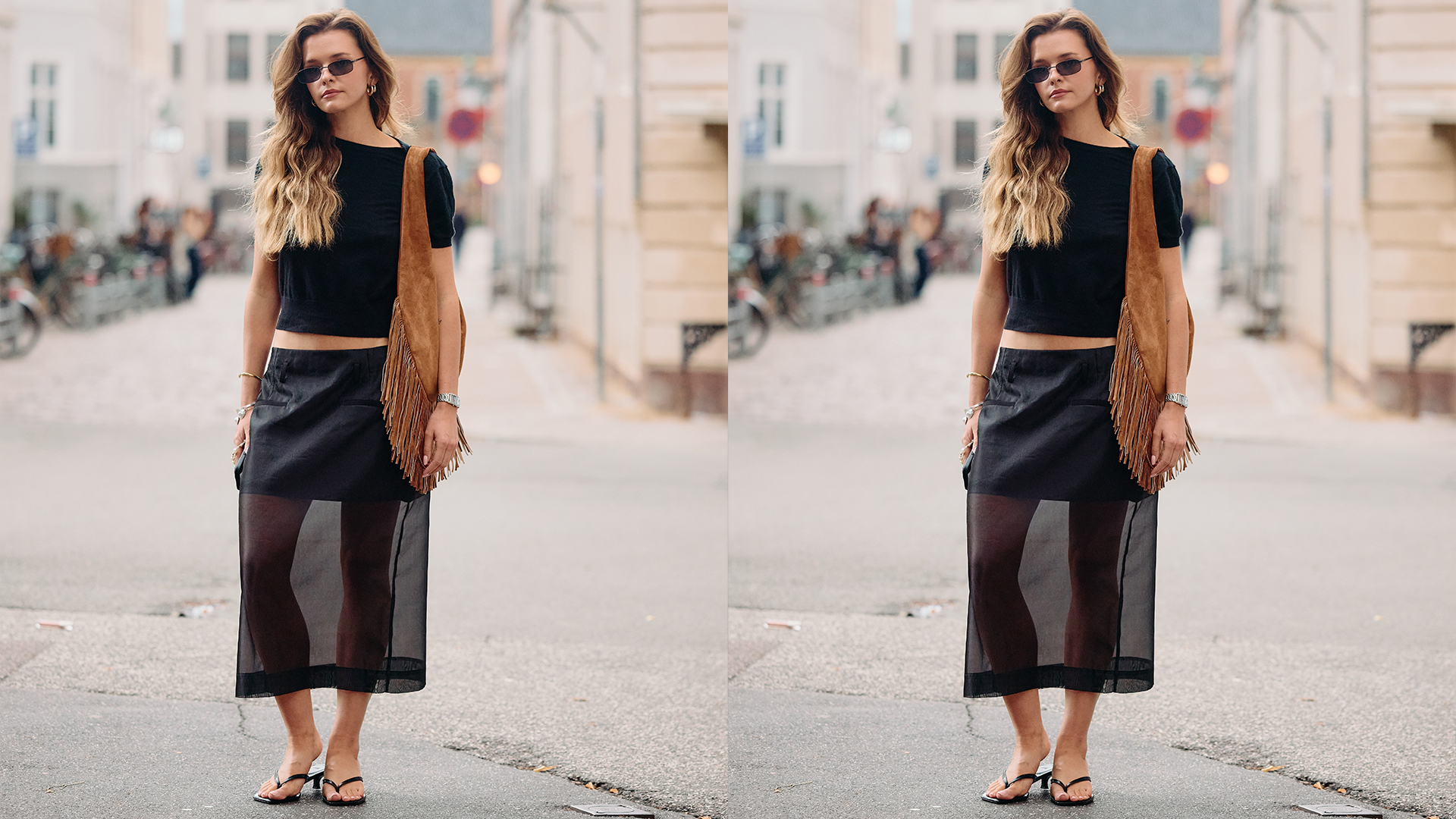 Woman wears black tee, black semi sheer skirt, large suede shoulder bag, and thong kitten heels. 