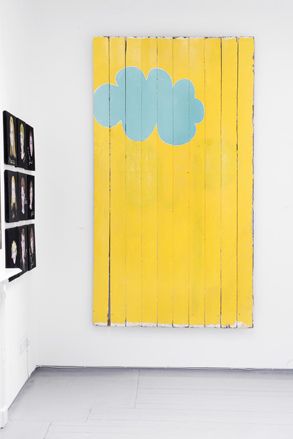 Painting of a cloud on a wall.