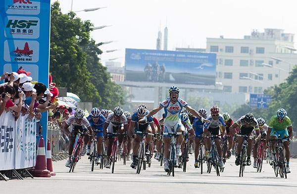 Dutchman Tom Veelers (Skil Shimano) sprouts his wings and lets fly with the stage victory in Wenchang.