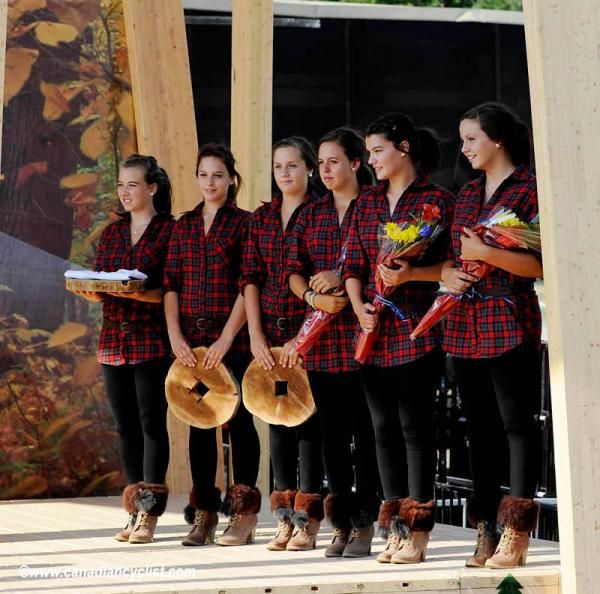 The podium girls were dressed as lumberjacks.