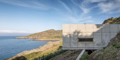 Costa Brava house rises above the cliffs and water | Wallpaper