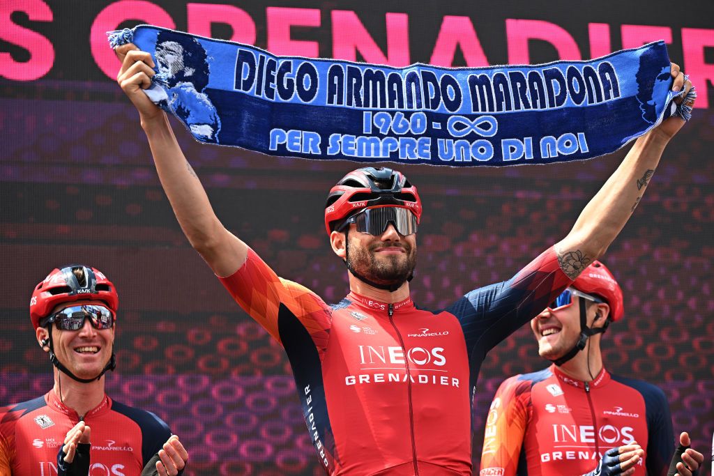 NAPLES ITALY MAY 11 Filippo Ganna of Italy and Team INEOS Grenadiers C waves a Napoli scarf with the name of Diego Armando Maradona on it prior to the 106th Giro dItalia 2023 Stage 6 a 162km stage from Naples to Naples UCIWT on May 11 2023 in Naples Italy Photo by Stuart FranklinGetty Images