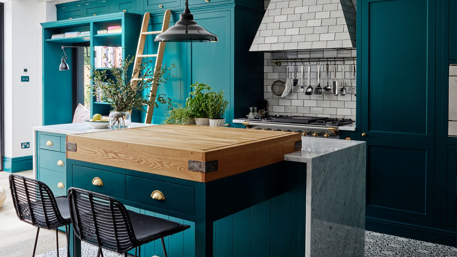 picture of deep green kitchen with island and tiled features