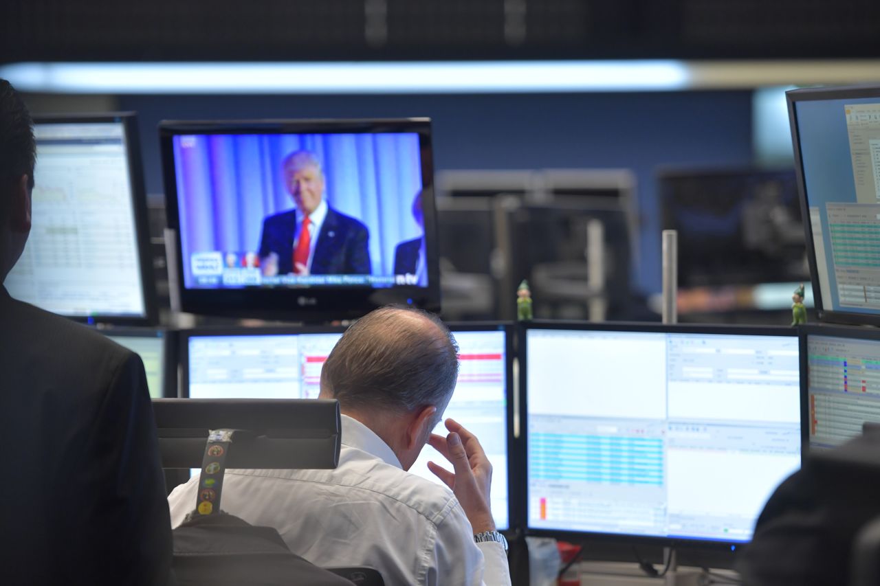 Traders watch as Donald Trump takes the U.S. presidency