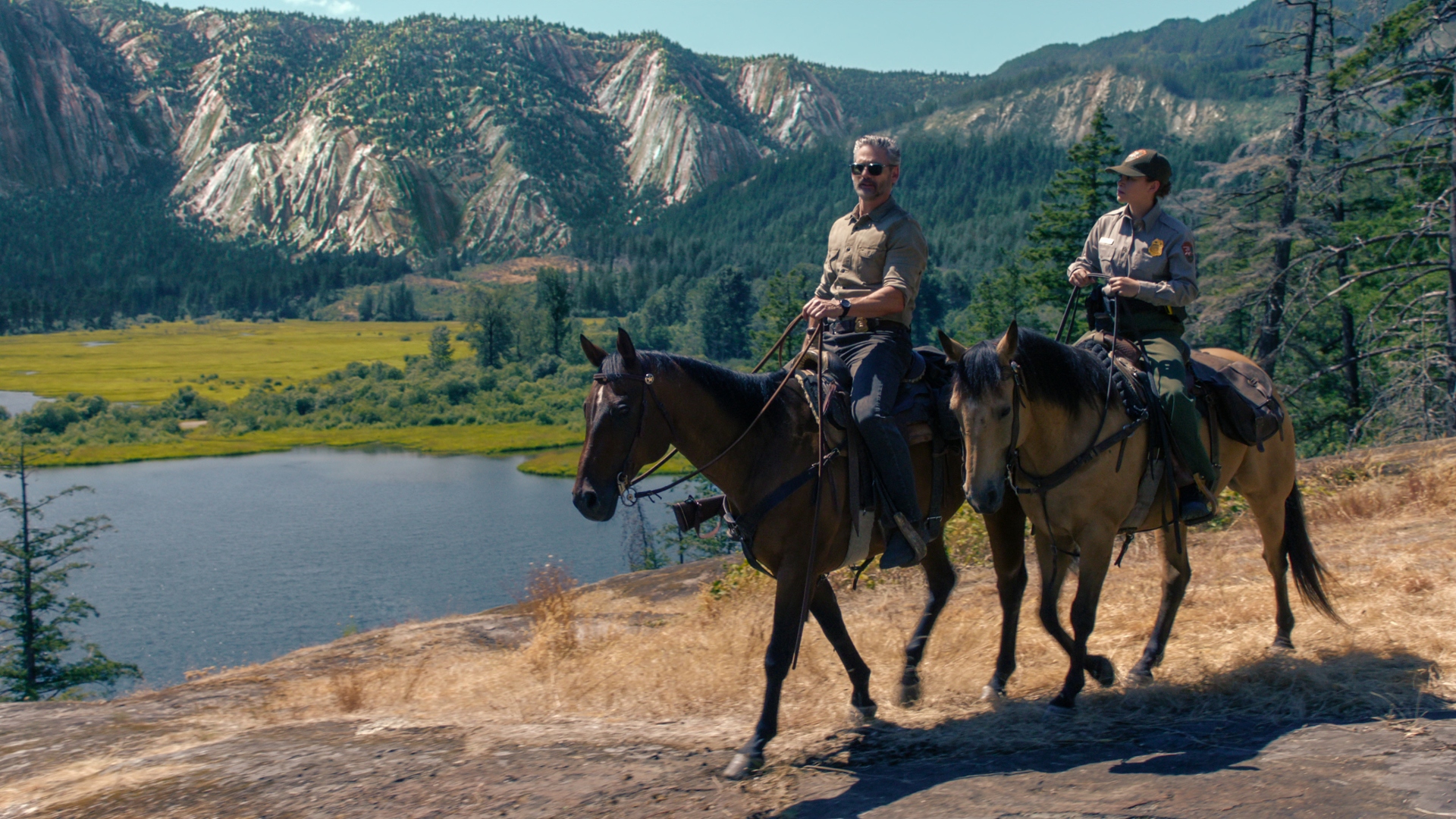 Kyle and Vasquez ride horses in Untamed season 1