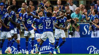 STRASBOURG, FRANCE - AUGUST 13: Jean-Ricner Bellegarde of Strasbourg (C) celebrates his goal with his fans during the Ligue 1 Uber Eats match between RC Strasbourg and Olympique Lyon at Stade de la Meinau on August 13, 2023 in Strasbourg, France. (Photo by Marcio Machado/Eurasia Sport Images/Getty Images)