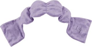 A lilac Nodpod gentle pressure eye mask