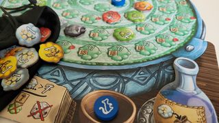 Close up of board and pieces from the The Quacks of Quedlinburg board game