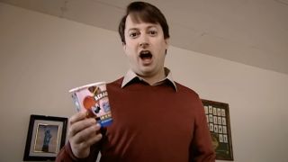 Mark holding pint of Ben and Jerry's ice cream in Peep Show