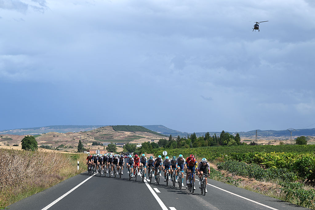 ALFARO, SPAIN - AUGUST 31: A general view of Torstein Traeen of Norway and Team Bahrain - Victorious - Red Leader Jersey and the peloton competing during the La Vuelta - 80th Tour of Spain 2025, Stage 9 a 195.5km stage from Alfaro to Estacion de Esqui de Valdezcaray 1541m / #UCIWT / on August 31, 2025 in Alfaro, Spain. (Photo by Dario Belingheri/Getty Images)