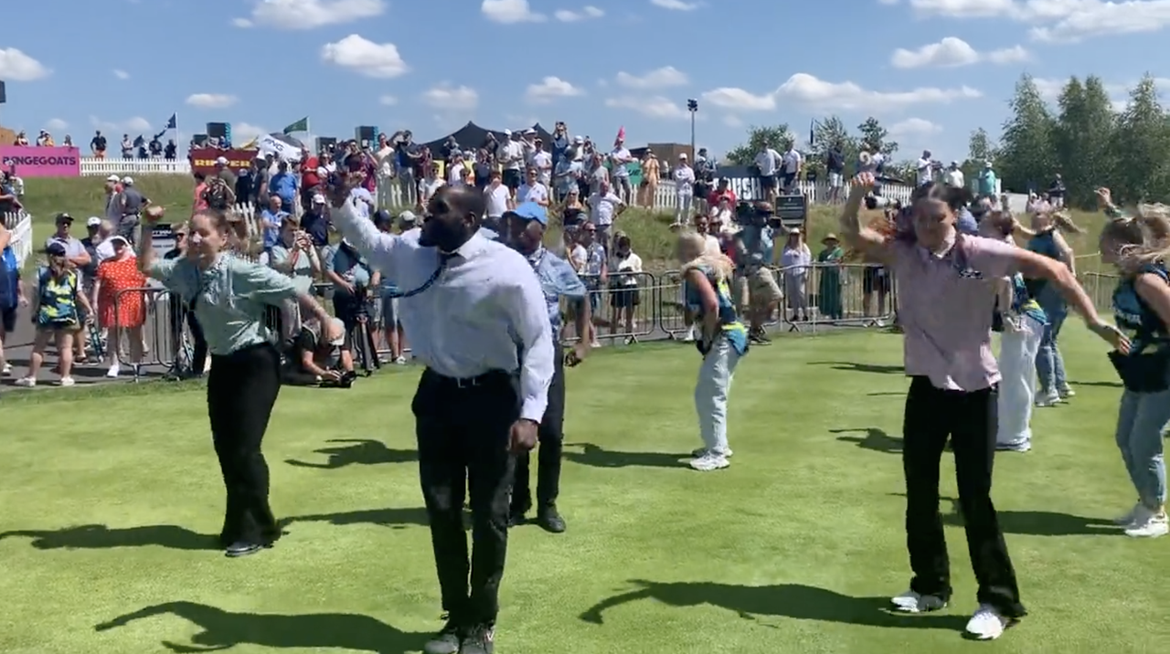 Dancers perform a flashmob on the first tee prior to LIV Golf&#039;s London event