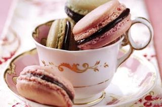 Pink strawberry macaroons with chocolate filling