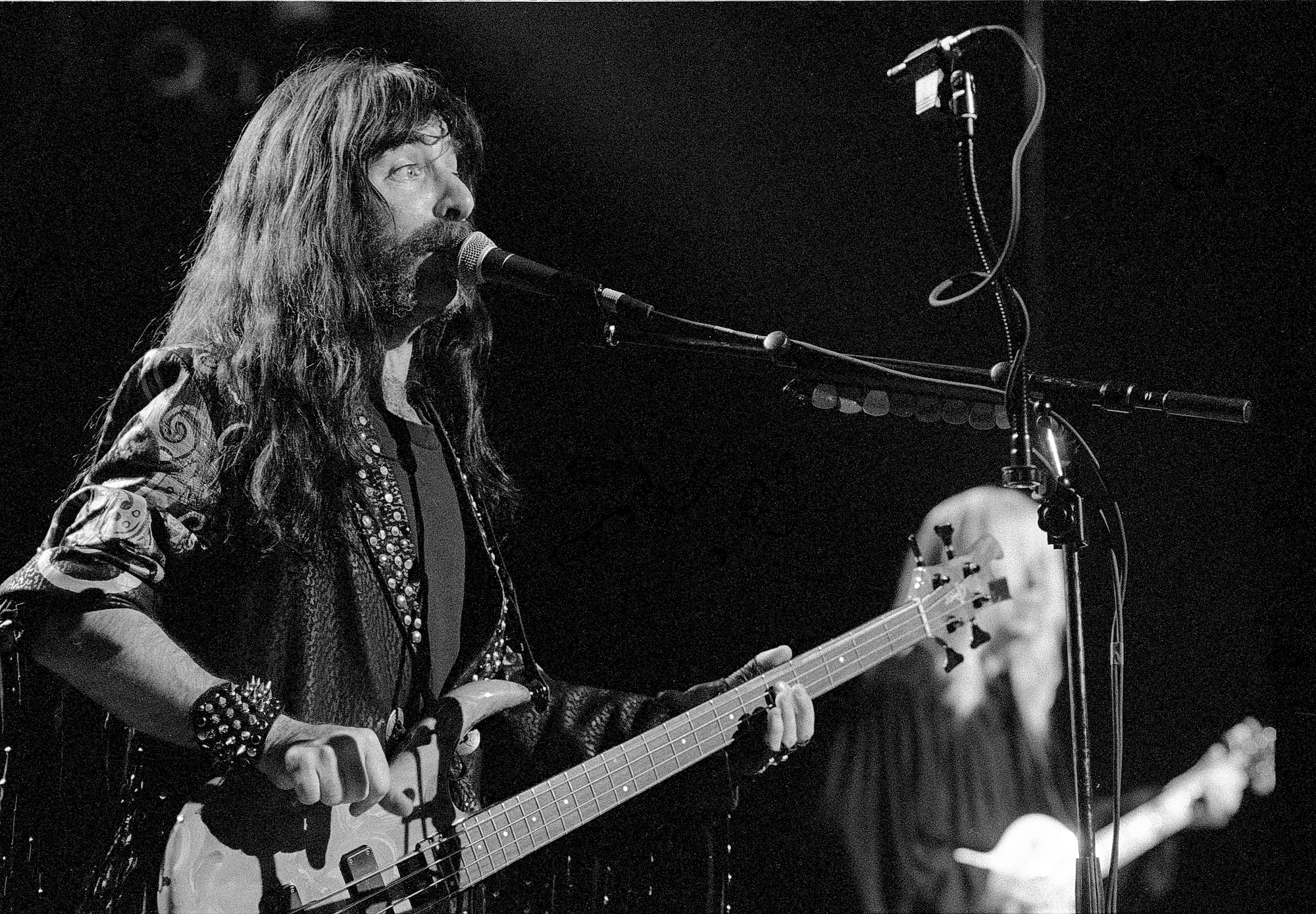 Derek Smalls (Harry Shearer) performs onstage with Spinal Tap at the Fox Theater in Atlanta, Georgia on June 12, 1992