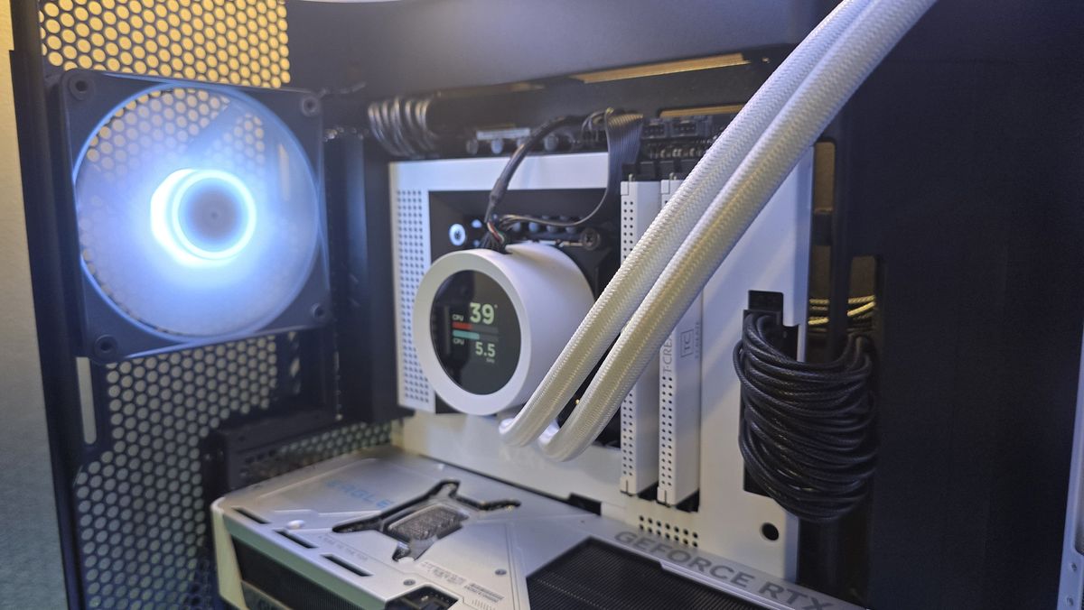The NZXT Kraken Plus 360 RGB liquid cooler installed in a test bench.