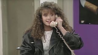 Tori on the phone in Saved by the Bell