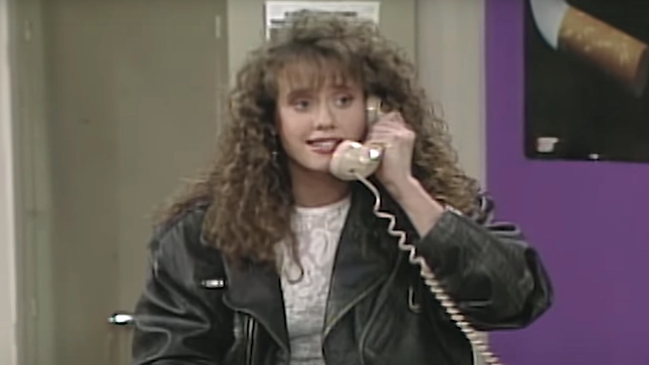 Tori on the phone in Saved by the Bell
