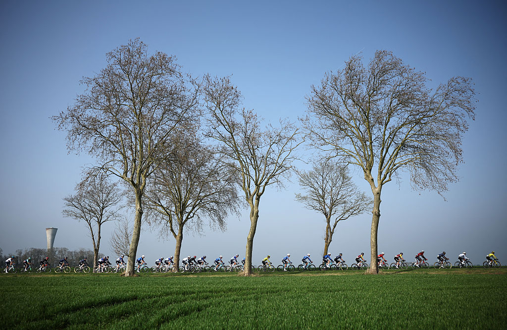 The pack rides during the 1st stage of the Paris-Nice cycling race, 170.9 km between Ach&amp;egrave;res and Carri&amp;egrave;res-sous-Poissy, on March 8, 2026. (Photo by Anne-Christine POUJOULAT / AFP)