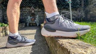 Man wearing the Lululemon Beyondfeel running shoes outside