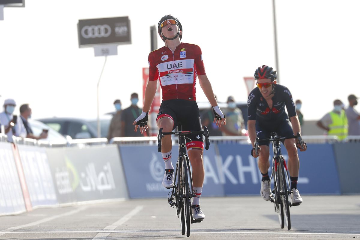 Tadej Pogacar celebrates winning stage 3
