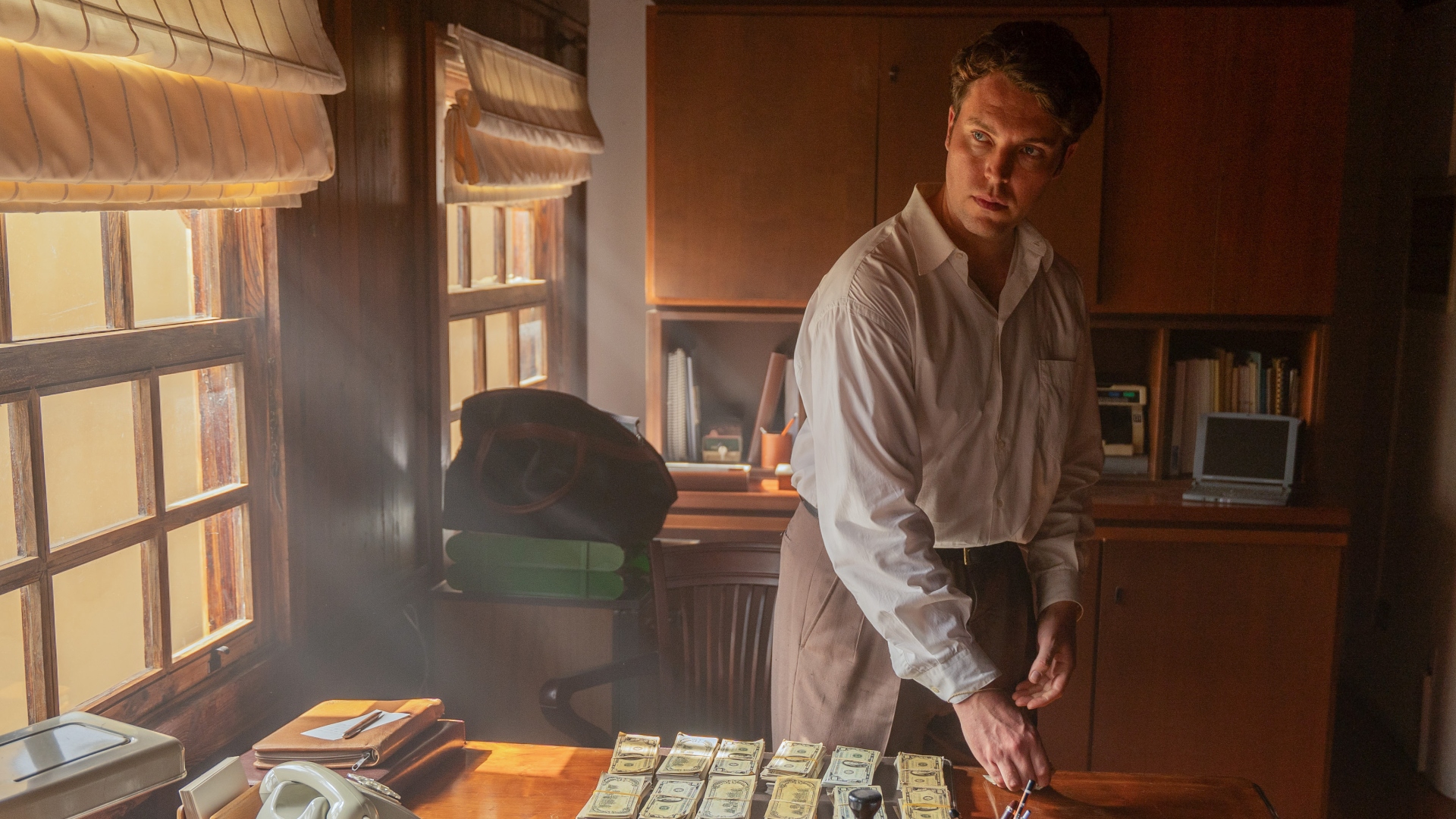 Logan counts money in The Gold season 2