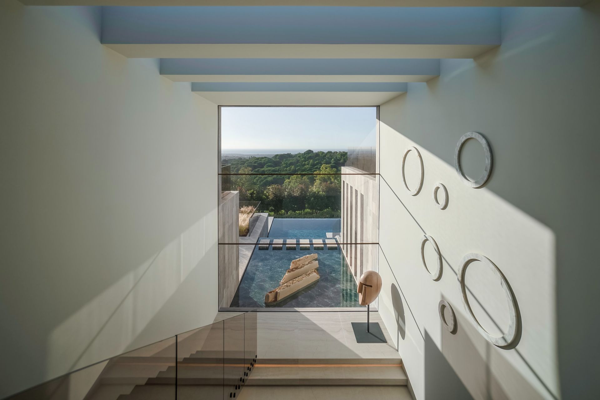 Villa ENSO by ARK Architects in Sotogrande, a luxurious villa with concrete and stone surfaces and swimming pools