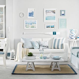 living room white wall and sofa set with cushions
