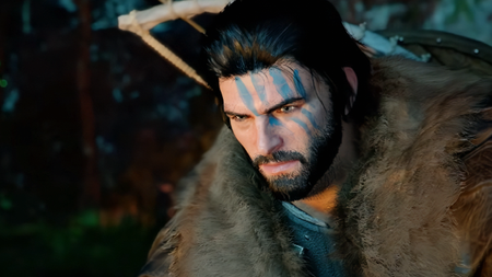 Kliff, from Crimson Desert, stares longingly into a fire.