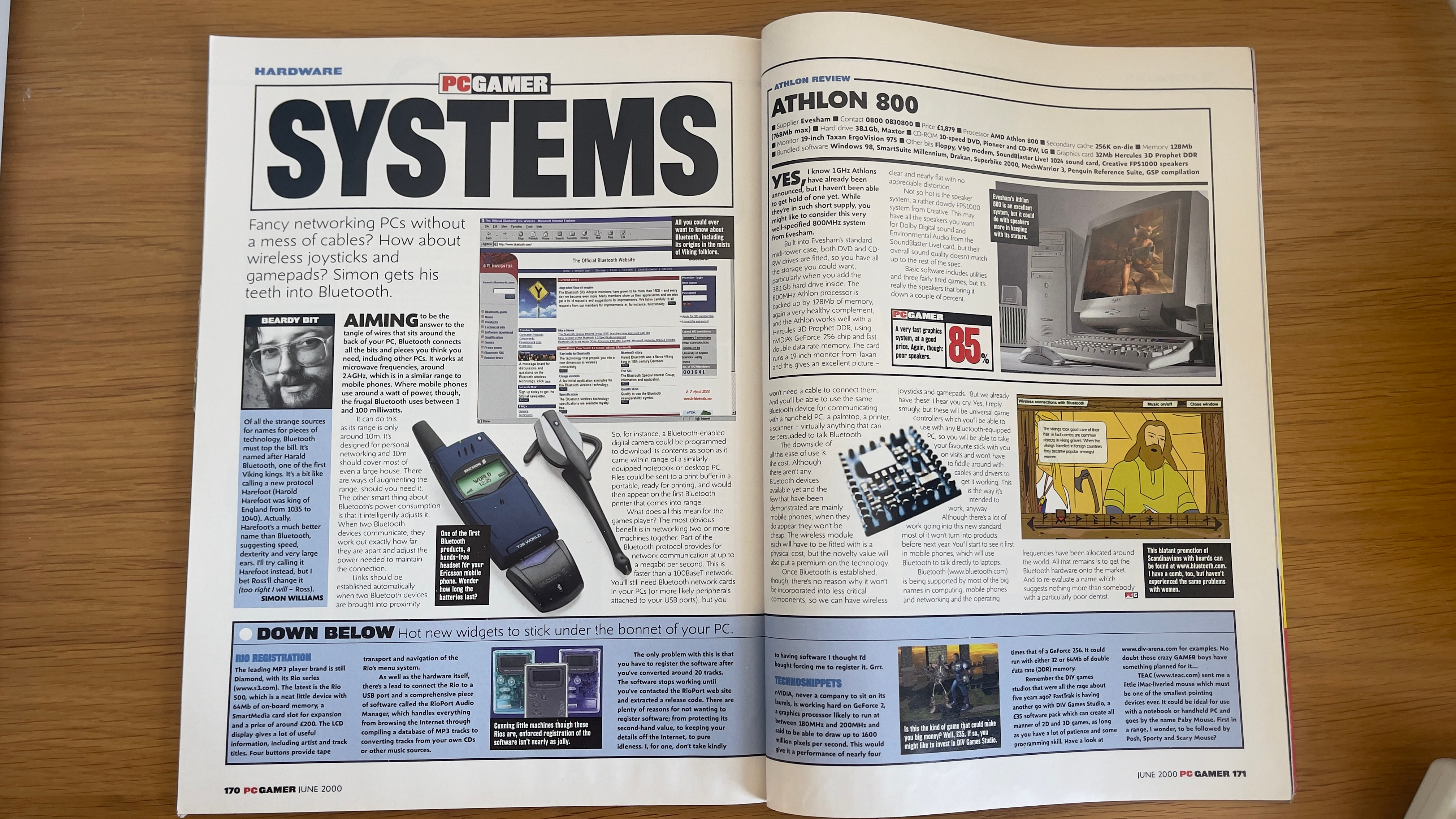 A double-page spread of PC Gamer magazine.
