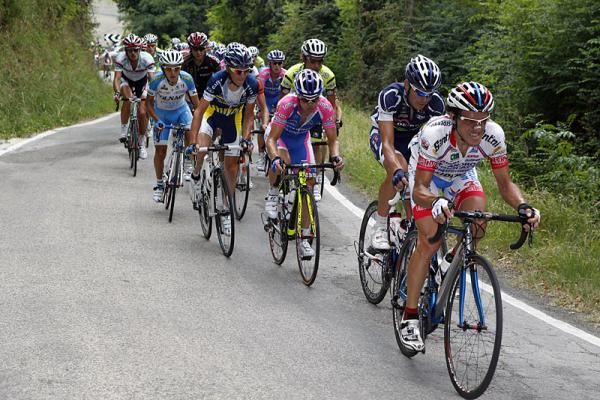 Alessandro Bertolini (Androni Giocattoli) sets the pace.