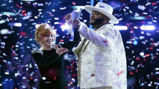 Reba McEntire congratulates team member Asher HaVon on winning The Voice Season 25.