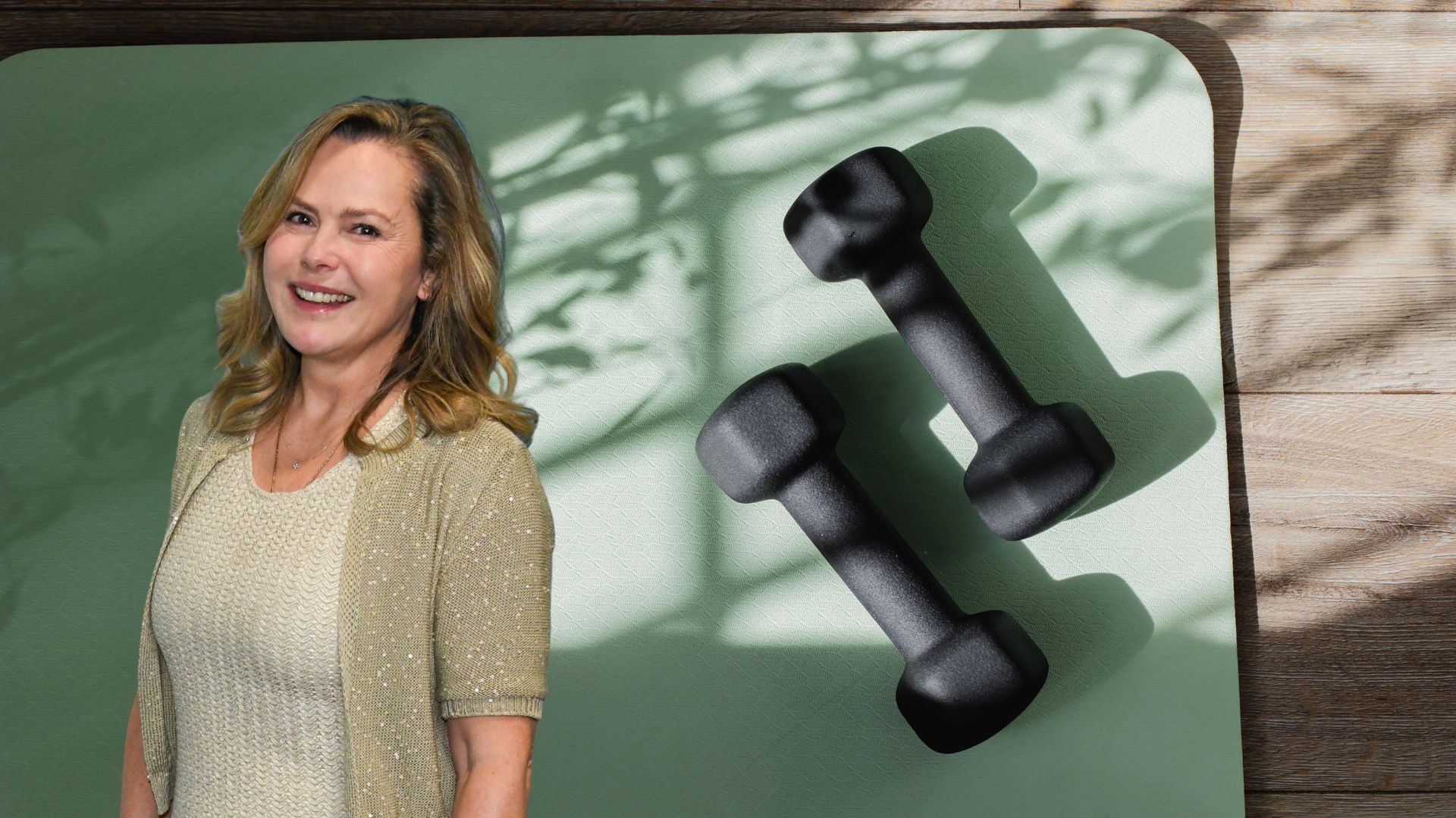 Liz Earle next to dumbbells on yoga mat