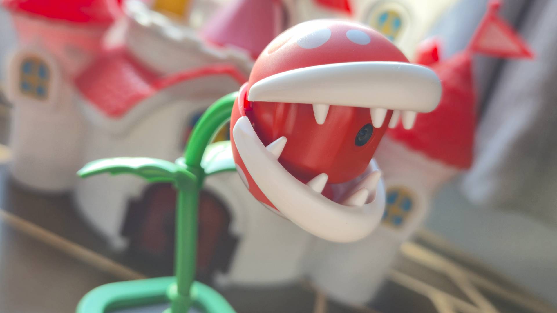 Photo by Rosalie Newcombe of a side-on view of the Hori Piranha Plant Switch 2 camera.