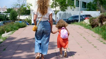 Parent walking child to school