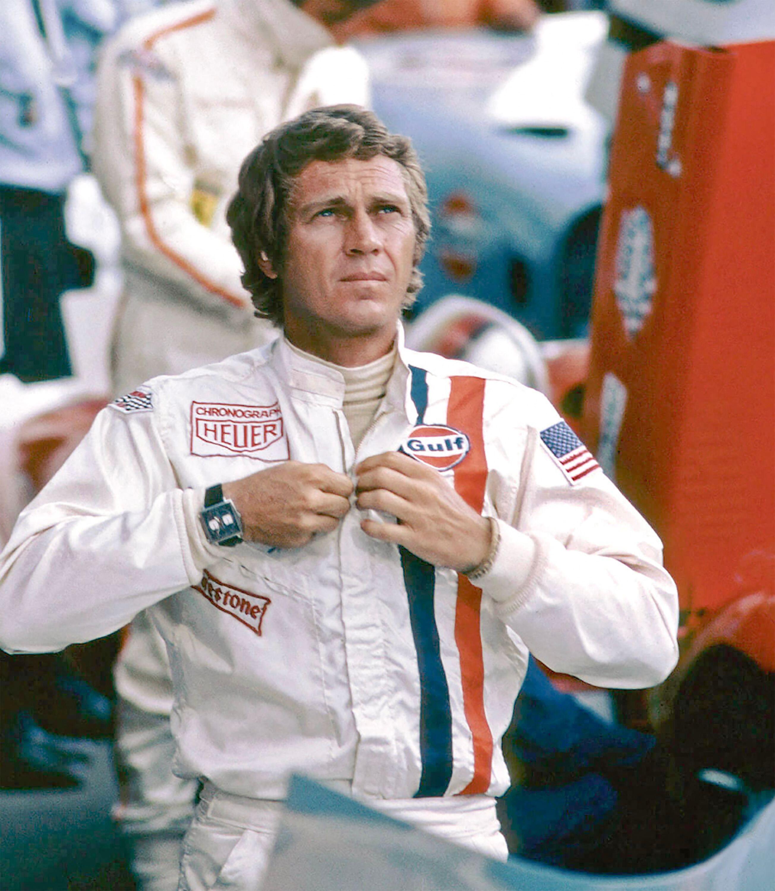 Steve McQueen on the set of Le Man in a white race suit