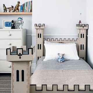 white children bedroom with bed and drawer